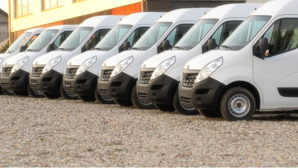 Fleet of Work Vans Lined Up